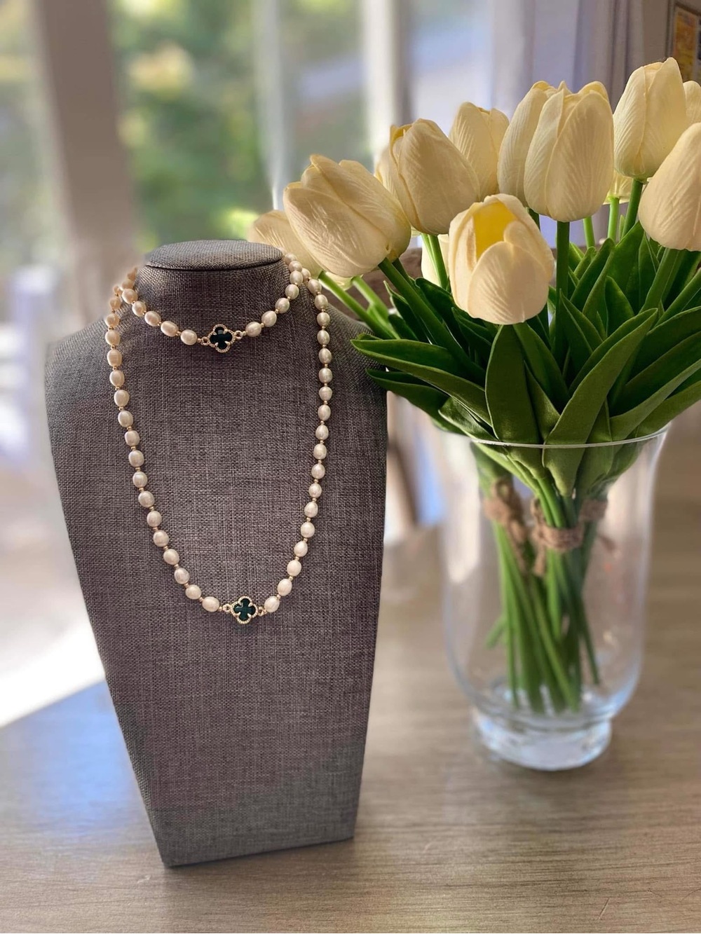 Lustrous White Pearl Necklace with Black Clover Accents